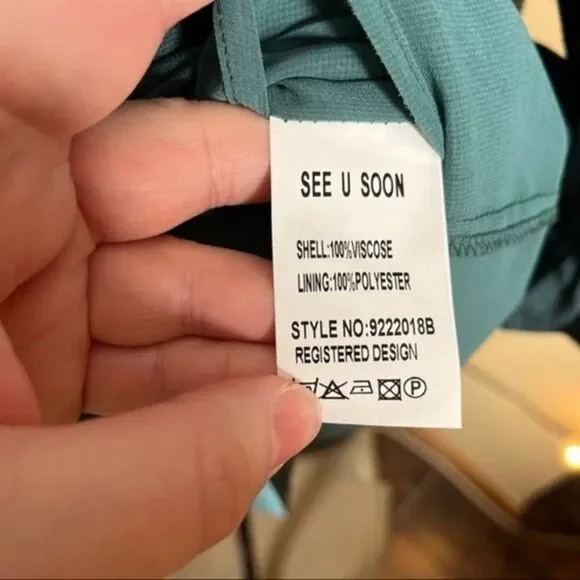 SEE U SOON | Puff Sleeve Emerald Smocked Oversized Wrap Dress - Picture 13 of 14